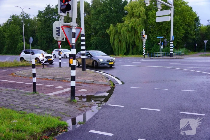 Auto klapt op verkeerslicht