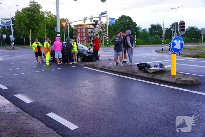 Auto klapt op verkeerslicht