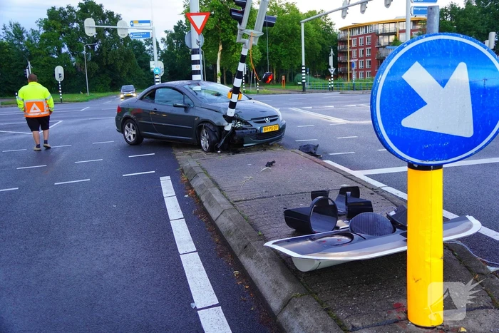 Auto klapt op verkeerslicht