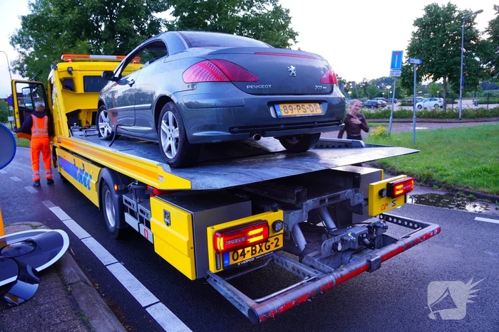 Auto klapt op verkeerslicht