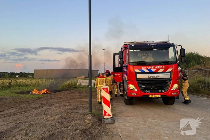 Scooter en pallet verwoest door brand