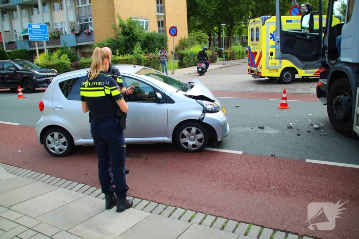 Ongeval tussen vuilniswagen en auto