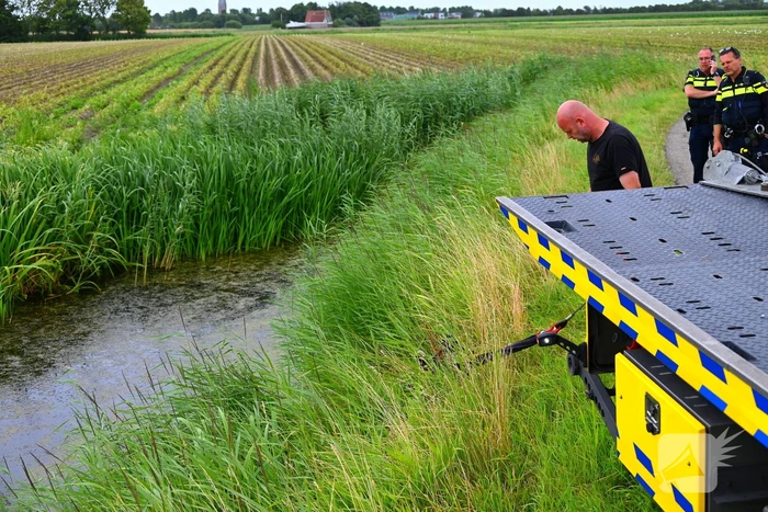 Motor belandt in het water