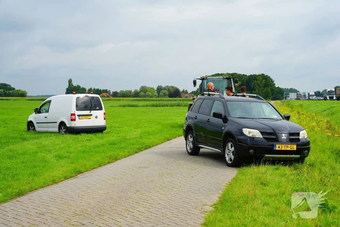 Auto in sloot na ongeluk
