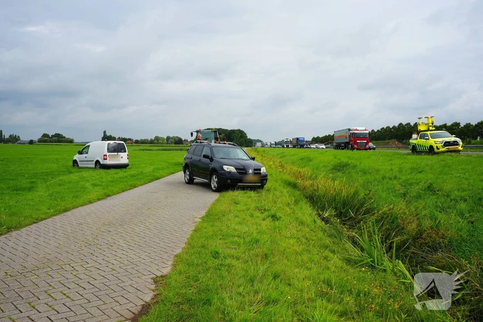 Auto in sloot na ongeluk