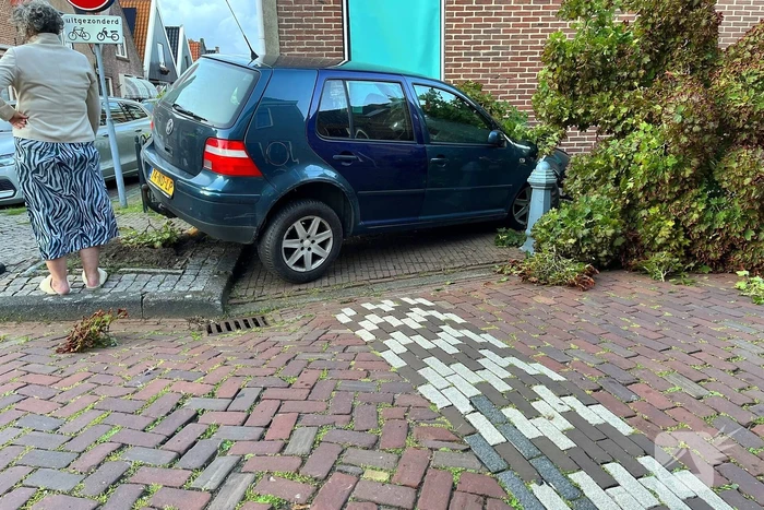 Auto ramt woning