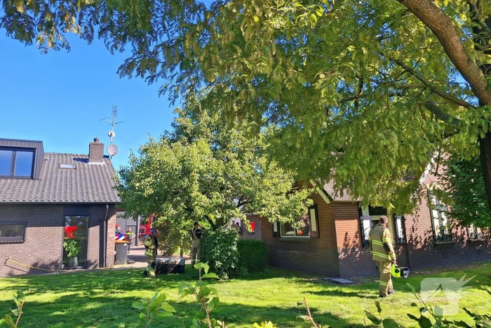Brandweer in actie bij woningbrand