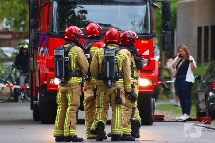 Brand in elektrische auto bij woning