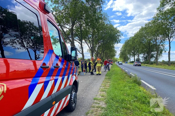 Driewielerbestuurder raakt te water