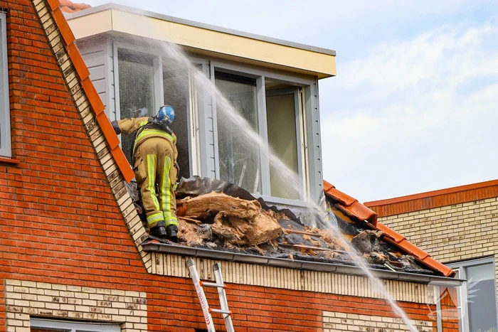 Woningbrand leidt tot ontruiming en grote hulpverlening