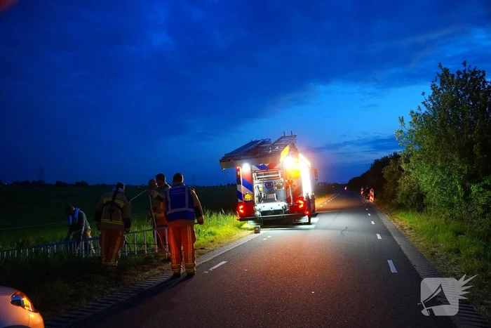 Reddingsactie door brandweer en boer