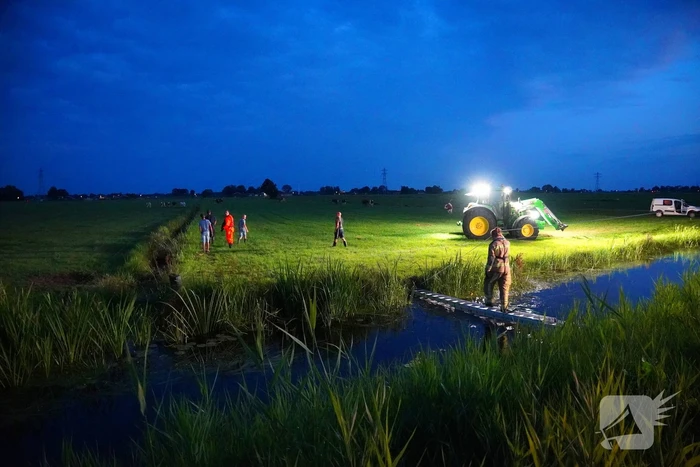 Reddingsactie door brandweer en boer