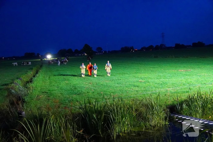 Reddingsactie door brandweer en boer