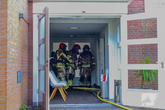 Brand in aula begraafplaats geblust