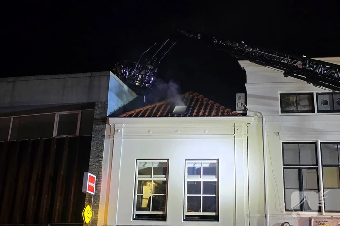 Grote brand boven winkels