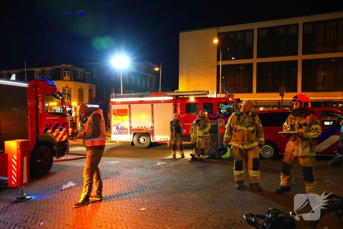Grote brand boven winkels