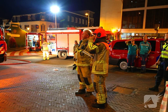 Grote brand boven winkels
