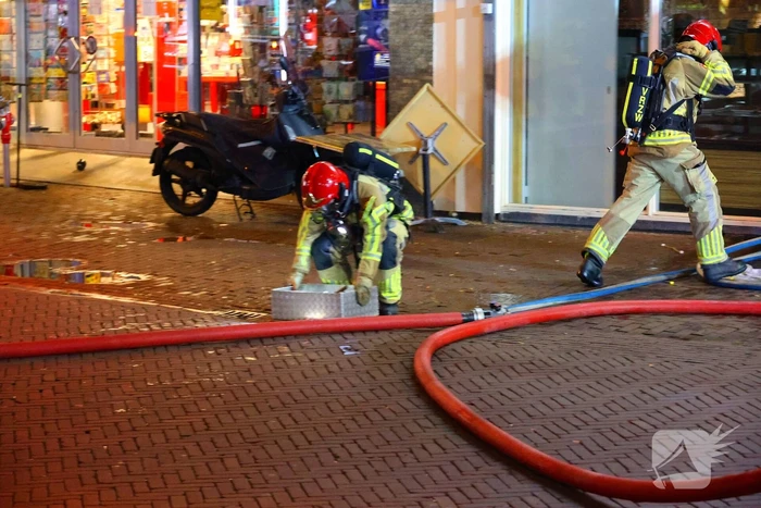 Grote brand boven winkels