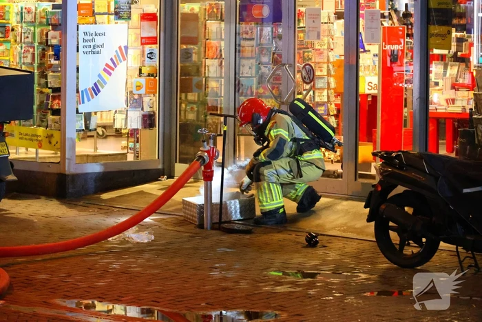 Grote brand boven winkels