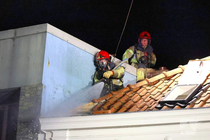 Grote brand boven winkels