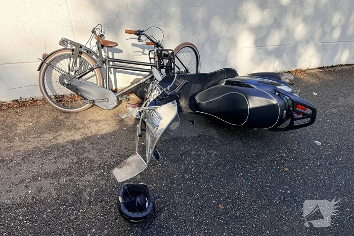 Scooter en fietser botsen in ongeval