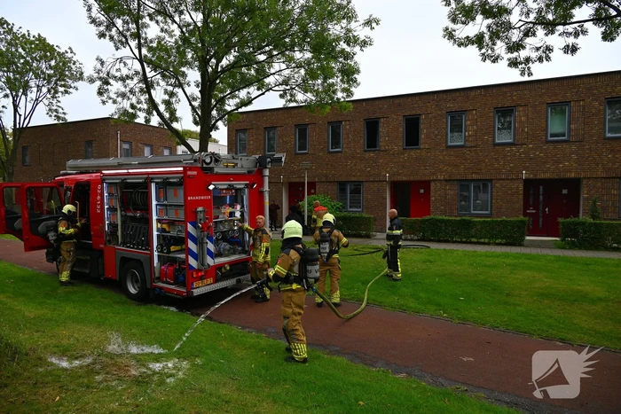 Rookontwikkeling door pan op het vuur