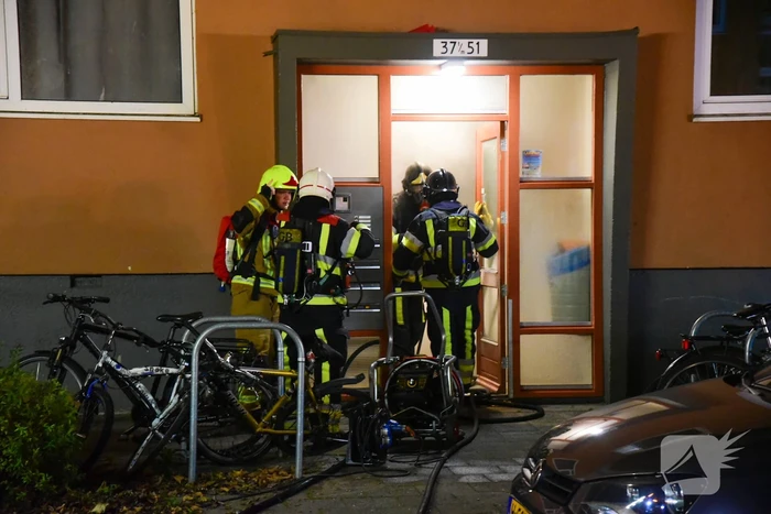 Flinke brand in kelderruimte portiekflat