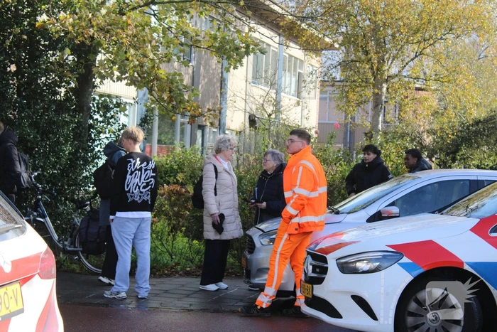 Twee voertuigen raken elkaar bij splitsing