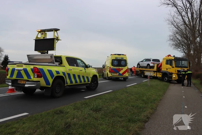 Botsing tussen auto en taxi