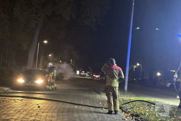 Rookontwikkeling uit geparkeerde auto