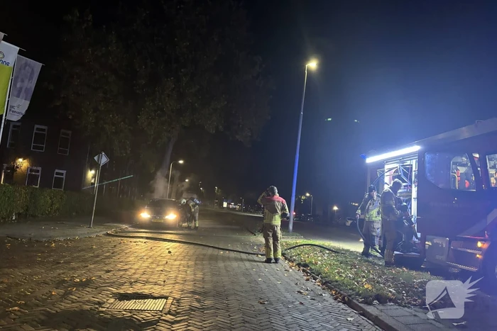 Rookontwikkeling uit geparkeerde auto