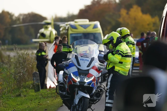 Fietser te water in ernstige situatie