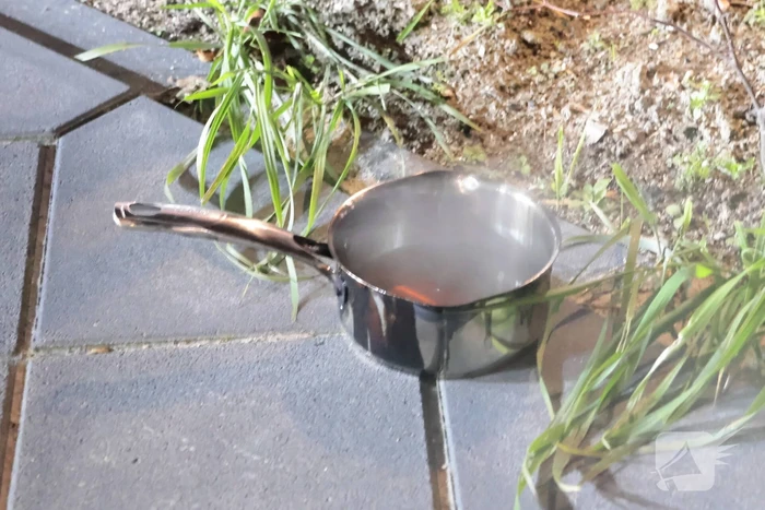 woningbrand door vlam in pan
