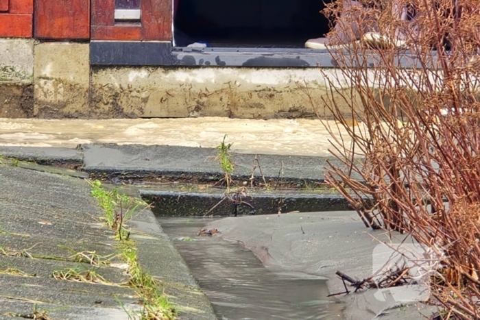 Sinkhole voor woning ontstaan