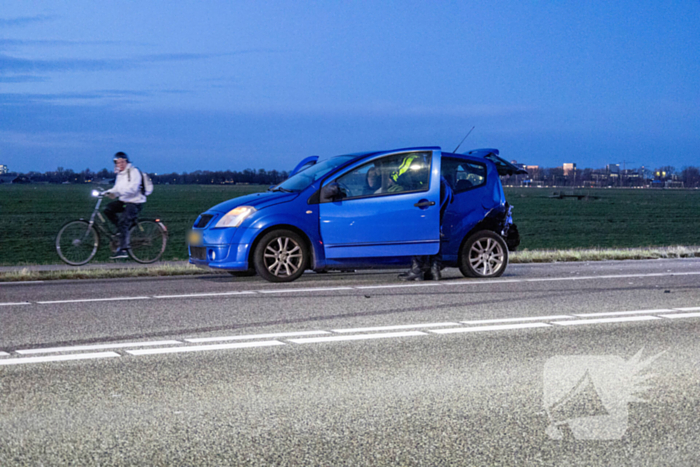 Auto te water na botsing