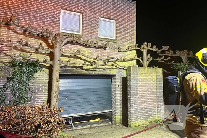 Brand in garage van woning