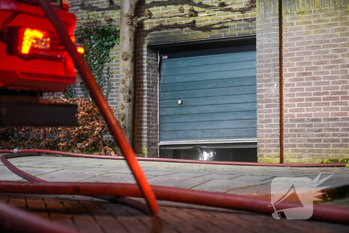 Brand in garage van woning