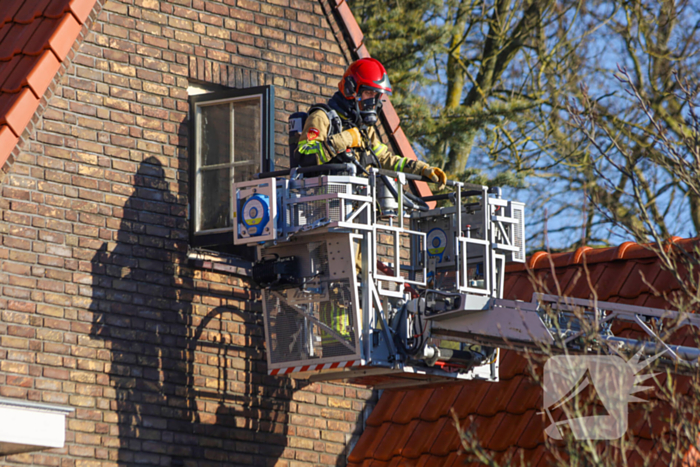 Flinke rookontwikkeling bij brand in hoekwoning