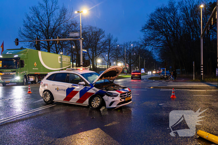 Forse schade na ongeval met politieauto