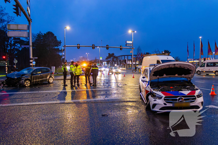 Forse schade na ongeval met politieauto