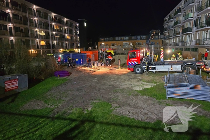 Kind bekneld onder pallet stenen