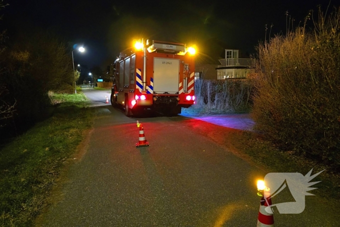 Brandweer bevrijdt duif uit schoorsteen