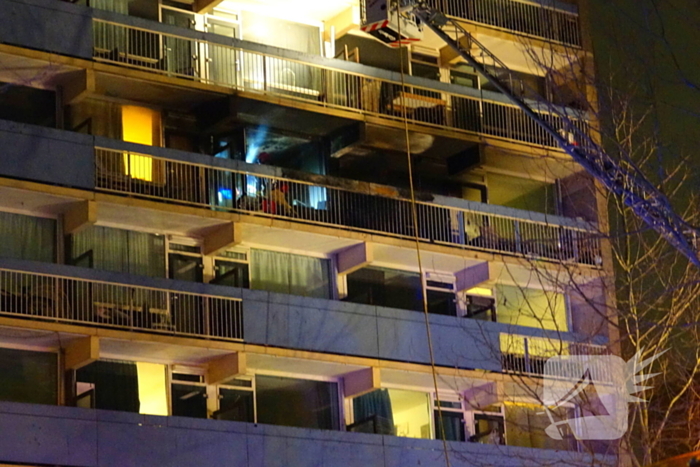 Deel van flat ontruimd wegens grote brand