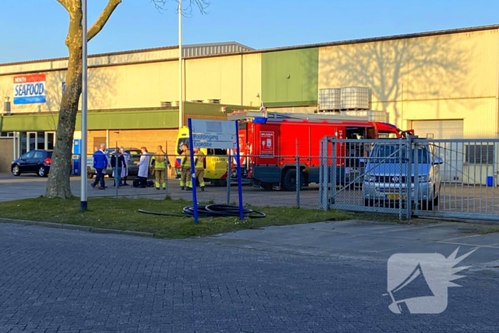 Persoon bekneld in bedrijfspand