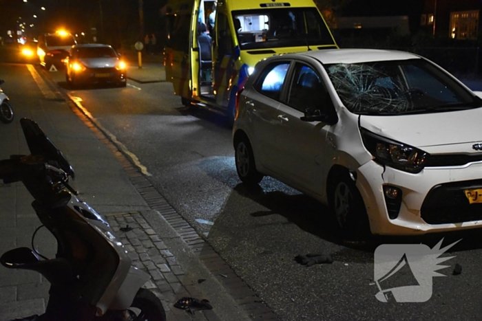 Ongeval tussen scooter en auto