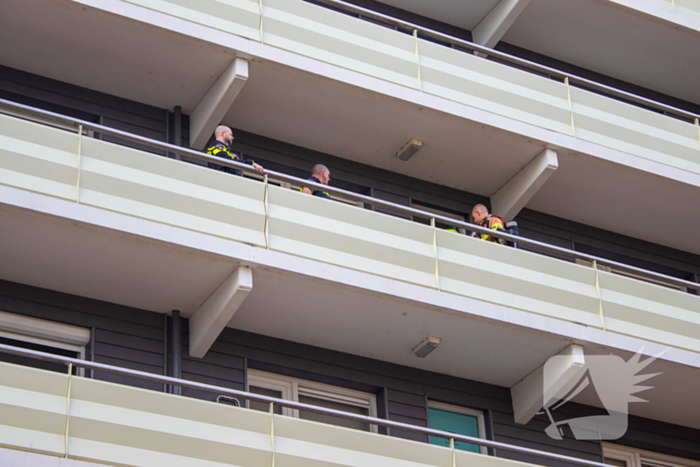 Brand in flatwoning snel onder controle