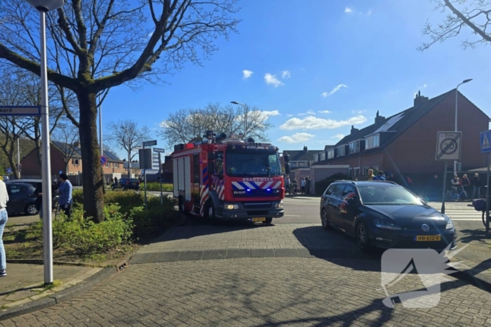 Brandweer schaalt op bij woningbrand