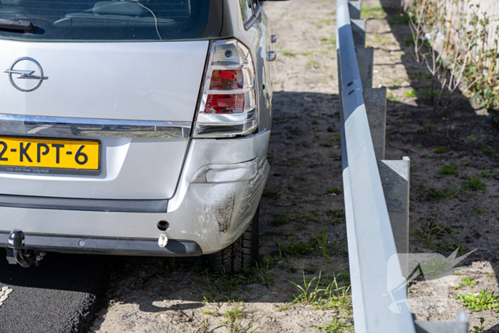 Schade en vertraging na kop-staartbotsing
