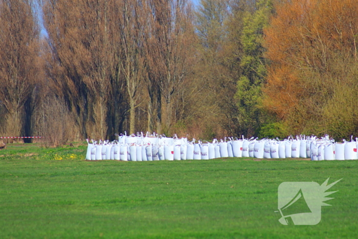 Zandzakken geplaatst ter voorkoming van overstroming
