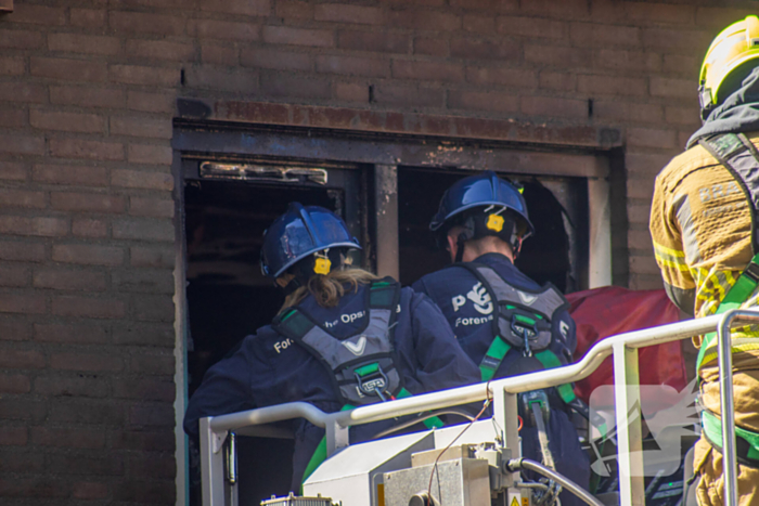 Dode aangetroffen bij woningbrand